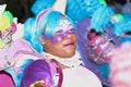 Young black woman dressed in colorful costume at Junkanoo