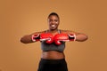 Young Black Woman Posing With Boxing Gloves At Studio Royalty Free Stock Photo