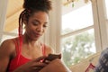 Young Black Woman Sending Phone Message And Smiling Royalty Free Stock Photo