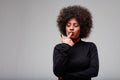 Young Black woman trying to make a choice or decision Royalty Free Stock Photo