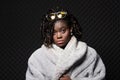 Black woman in fur coat Royalty Free Stock Photo