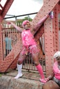 Young black women in pink and white paint