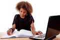 Young black women working on desk with computer