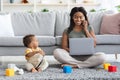 Young Black Working Mom Freelancing At Home And Taking Care About Baby Royalty Free Stock Photo