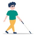 Young blind boy walking with a cane