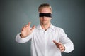 Young Blindfolded Businessman Royalty Free Stock Photo