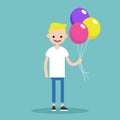 Young blond boy holding a bunch of colourful balloons