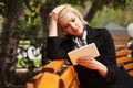 Young fashion blond business woman using digital tablet computer Royalty Free Stock Photo