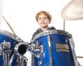 Young blond caucasian boy at drumset in studio Royalty Free Stock Photo