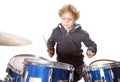 Young blond caucasian boy at drumset in studio Royalty Free Stock Photo