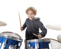 Young blond caucasian boy at drumset in studio Royalty Free Stock Photo