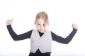 Young blond girl with confident attitude in studio