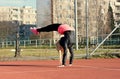 Young blond girl dancing break dance Royalty Free Stock Photo