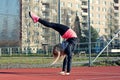 Young blond girl dancing break dance Royalty Free Stock Photo