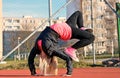 Young blond girl dancing break dance Royalty Free Stock Photo