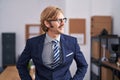 Young blond man business worker smiling confident standing at office Royalty Free Stock Photo