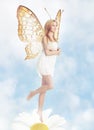 Young blond woman as butterfly Royalty Free Stock Photo