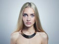 Young blond woman.Beautiful Girl.blonde in necklace Royalty Free Stock Photo