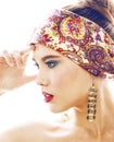 Young blond woman dressed like ancient greek godess, gold jewelry close up , beautiful girl hands manicured