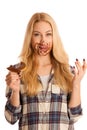 Young blond woman eating breakfast bread and nougat spread isolated over white background Royalty Free Stock Photo