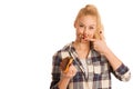 Young blond woman eating breakfast bread and nougat spread isolated over white background Royalty Free Stock Photo