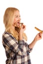 Young blond woman eating breakfast bread and nougat spread isolated over white background Royalty Free Stock Photo