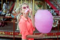 Woman eating cotton candy