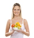 A young blond woman holding a fresh salad Royalty Free Stock Photo