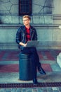 Young blonde American Man studying, working in New York