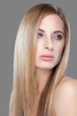 Young blonde beauty with straight hair Royalty Free Stock Photo