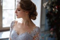 Young blonde bride woman in a light blue wedding dress Royalty Free Stock Photo