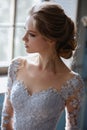 Young blonde bride woman in a light blue wedding dress Royalty Free Stock Photo