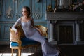 Young blonde bride woman in a light blue wedding dress