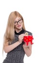 Young blonde businesswoman drop bitcoin into piggy bank isolated Royalty Free Stock Photo