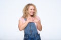 Young blonde curly laughing woman having positive mood.