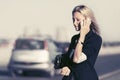 Young blonde fashion business woman calling on cell phone Royalty Free Stock Photo