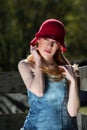 Young Blonde Female in Red Hat Out Door Portrait Royalty Free Stock Photo