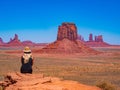 Young blonde girl admires the Monument Valley Artist`s Point Royalty Free Stock Photo