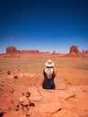Young blonde girl admires the Monument Valley Artist`s Point Royalty Free Stock Photo