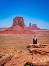 Young blonde girl admires panorama from Artist's Point in Oljato Monument Valley Royalty Free Stock Photo