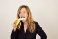 Woman eating banana Royalty Free Stock Photo