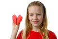 Young blonde girl with red heart