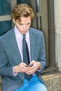 Young Man Texting anywhere Royalty Free Stock Photo