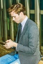 Young Man Texting anywhere Royalty Free Stock Photo