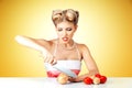 Young woman cutting onion Royalty Free Stock Photo