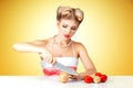 Young woman cutting onion Royalty Free Stock Photo