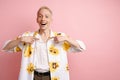 Young blonde laughing man pointing fingers at himself Royalty Free Stock Photo