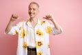 Young blonde laughing man pointing fingers at himself Royalty Free Stock Photo