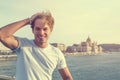 Young blonde man posing with Budapest panorama Royalty Free Stock Photo