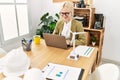 Young blonde woman architect using laptoo smiling at office Royalty Free Stock Photo